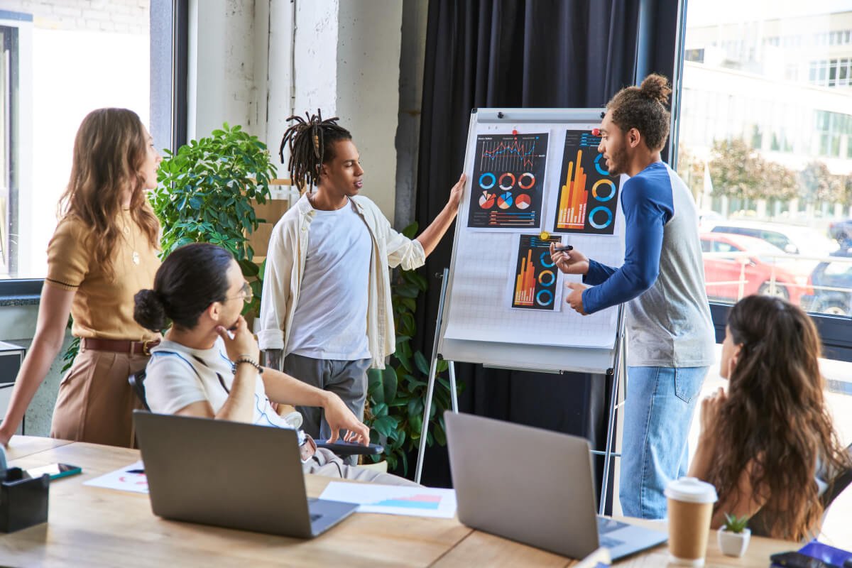 multicultural-colleagues-discussing-startup-projec-CPP7UNA.jpg